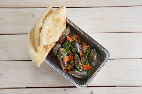 Baked oysters covered with bannock