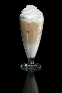 Milkshake cappuccino summer cocktail isolated on black