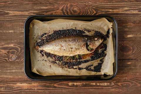Baked sea yellow tailed mackerel in baking tray