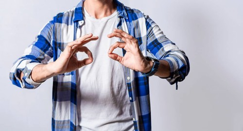 Deaf and dumb people speaking in sign language