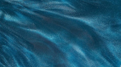 Particles azure dye water