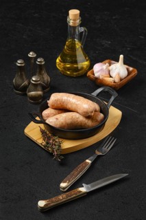 Raw traditional homemade British banger pork sausage ready for frying