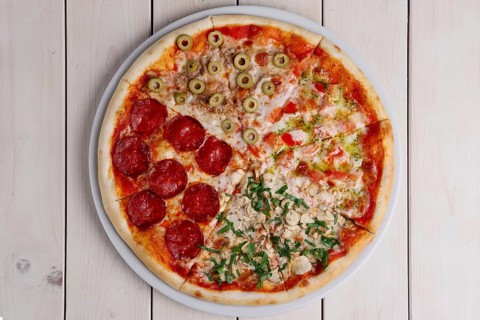 Top view of pizza four seasons