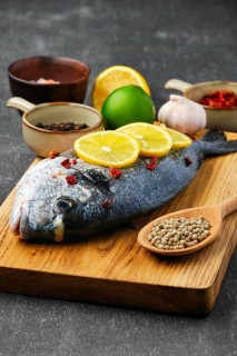 Gilt head bream with spice prepared for cooking