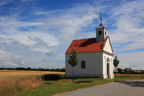 Small abandoned chapel in front of the power plant