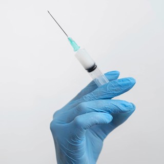 Doctor preparing vaccine