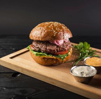 Tasty cheeseburger wooden board ready be served. Resolution and high quality beautiful photo