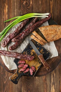 Overhead view of dried sausage made of venison and turkey spicy meat