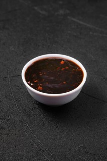 Small bowl with spicy teriyaki sauce