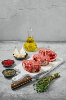 Raw fresh lamb saddle cut on sections