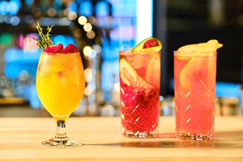 Three glass of cold lemonade on the barcounter
