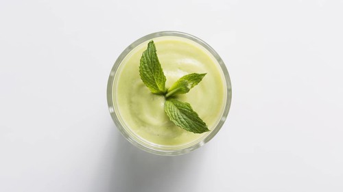 Top view green smoothie glass with mint. Resolution and high quality beautiful photo