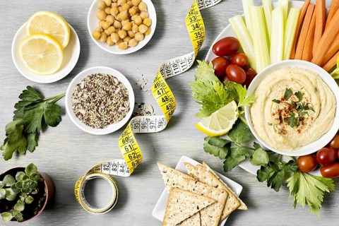 Top view hummus with assortment vegetables measuring tape. Resolution and high quality beautiful photo