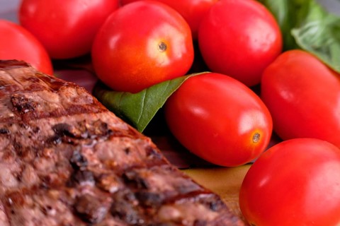 Macro photo of tomato cherry and steak