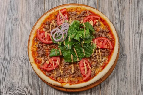 Top view of pizza with meat