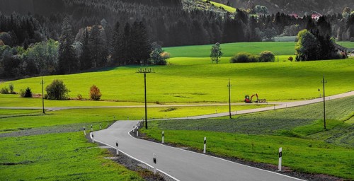 Forests and meadows and country road near Missen-Willhams