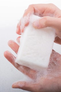 Hand washing and soap foam on a foamy background