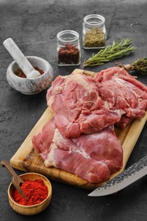 Raw fresh boneless turkey thigh with spices