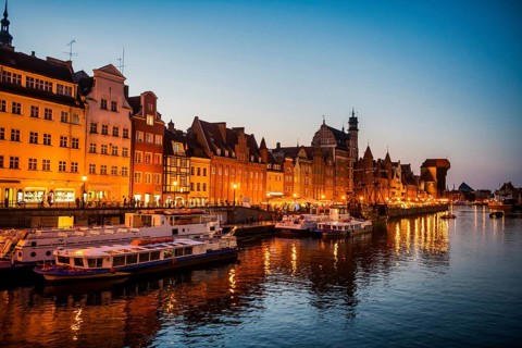 Hanseatic league houses on the Motlawa river at sunset