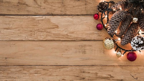 Cones with burning garland on table