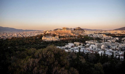 View from Philopappos Hill over the city at sunset