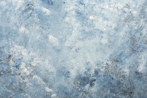 Dark blue textured stucco wall background