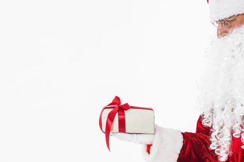 Santa claus glasses holding gift box. Resolution and high quality beautiful photo