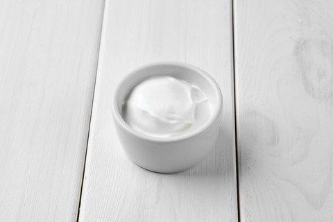 Sour cream in ceramic gravy boat