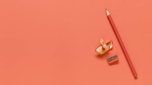 Red office supplies colored surface