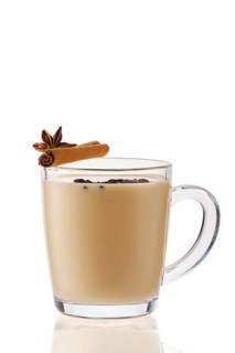 Hot milk winter drink with cinnamon and anise