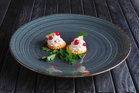 Appetizer for reception. Fish pate with lemon and cranberry