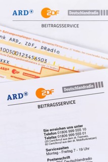 Contribution service of ARD and ZDF Rundfunkgebuehr GEZ with remittance slip in Stuttgart