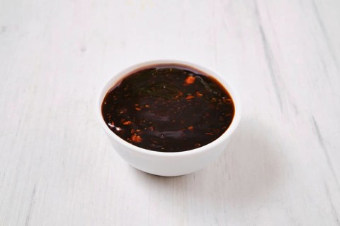 Small bowl with spicy teriyaki sauce