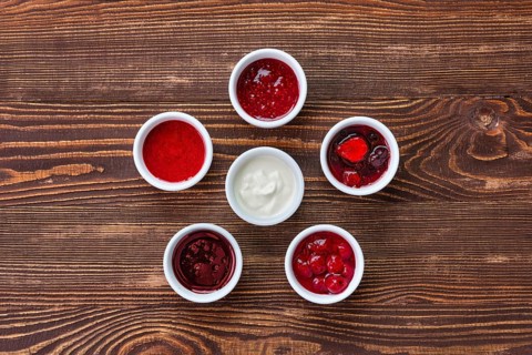 Overhead view of assortment of fruit puree. Jam