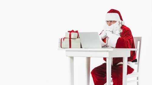 Santa claus looking laptop screen