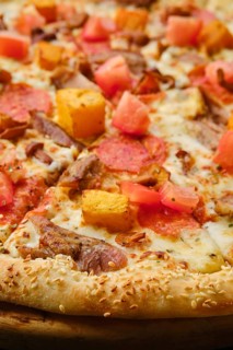 Macro photo of pizza with pumpkin