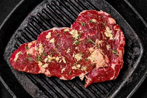 Preparation of ribeye steak in cast iron skillet
