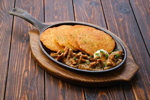 Cast iron skillet with fried chanterelles