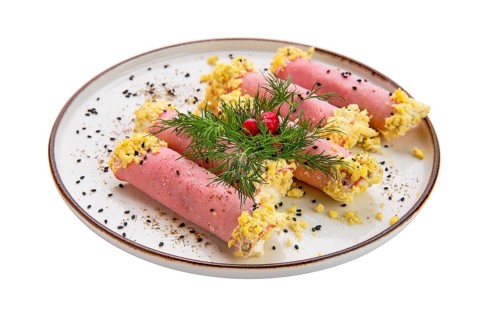 Delicious rolls made of ham stuffed with cheese