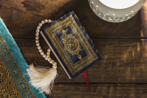 Lamp mat near quran