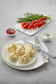 Frozen semifinished manti stuffed with lamb meat