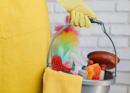 Close up bucket with cleaning products
