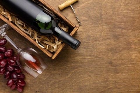 Top view wine bottle glass with grapes copy space. Resolution and high quality beautiful photo