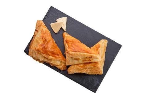 Puff pastry with cheese on slate plate