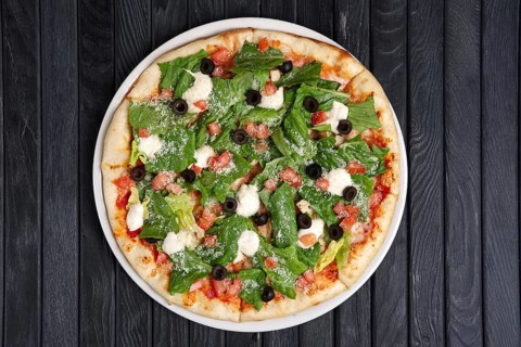 Top view of pizza with ham