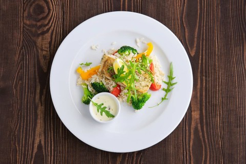 Top view of fried zander with rice
