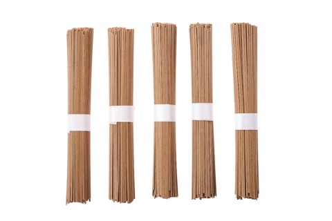 Dry soba buckwheat noodles isolated on white background