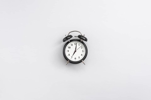 Office desktop with clock