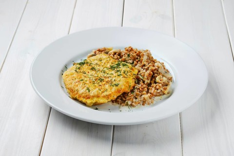 Chicken cutlet in breading with buckwheat and mushrooms