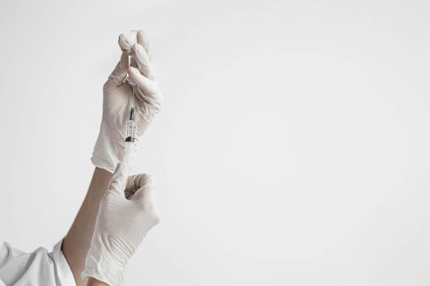 Doctor preparing medical vaccine